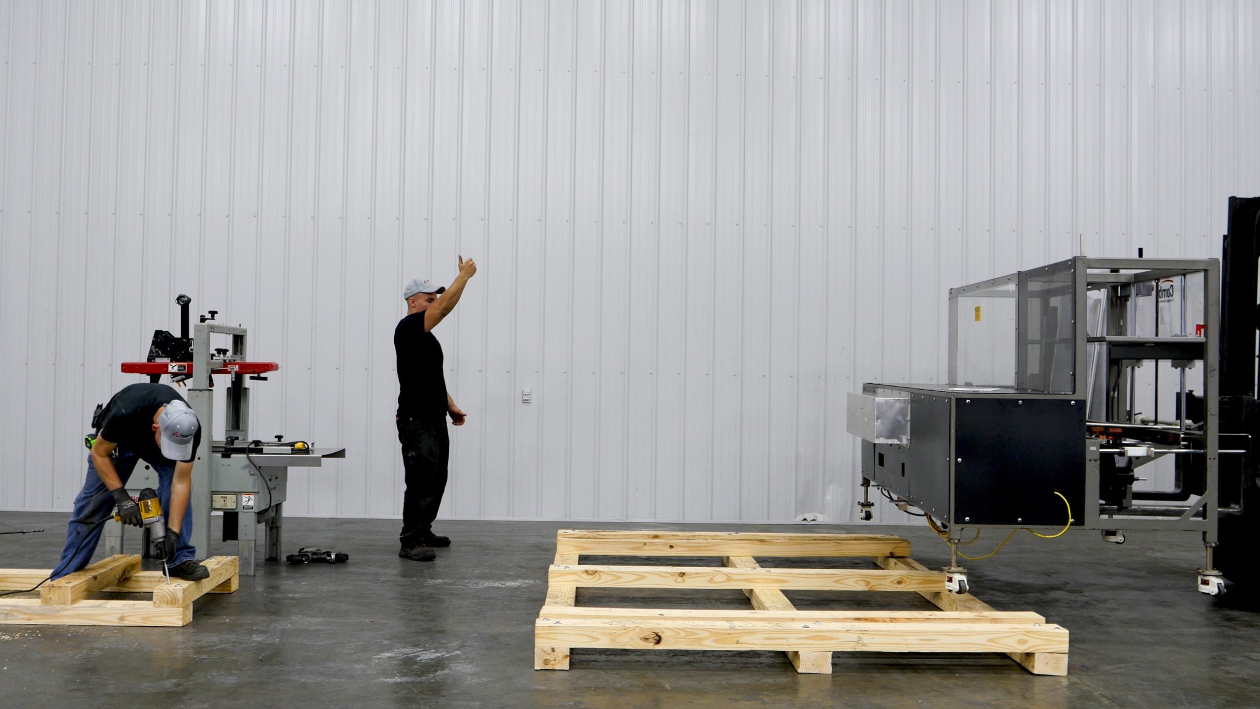 constructing custom skidding for packaging line equipment in a workshop